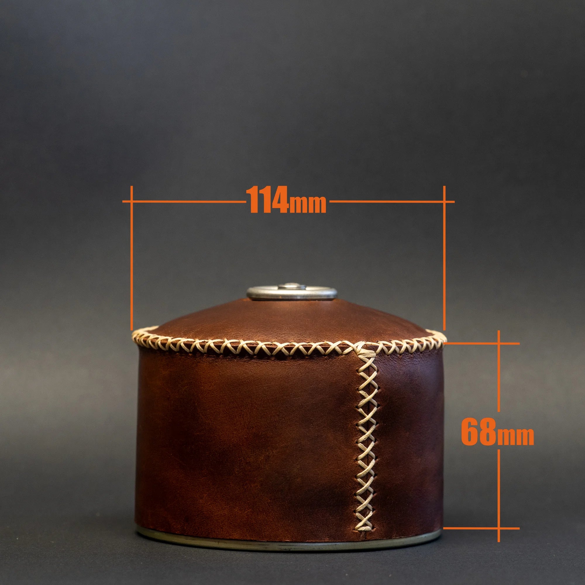TriCamp Leather Butane Cover angle — natural cowhide grain texture on camping gas cover