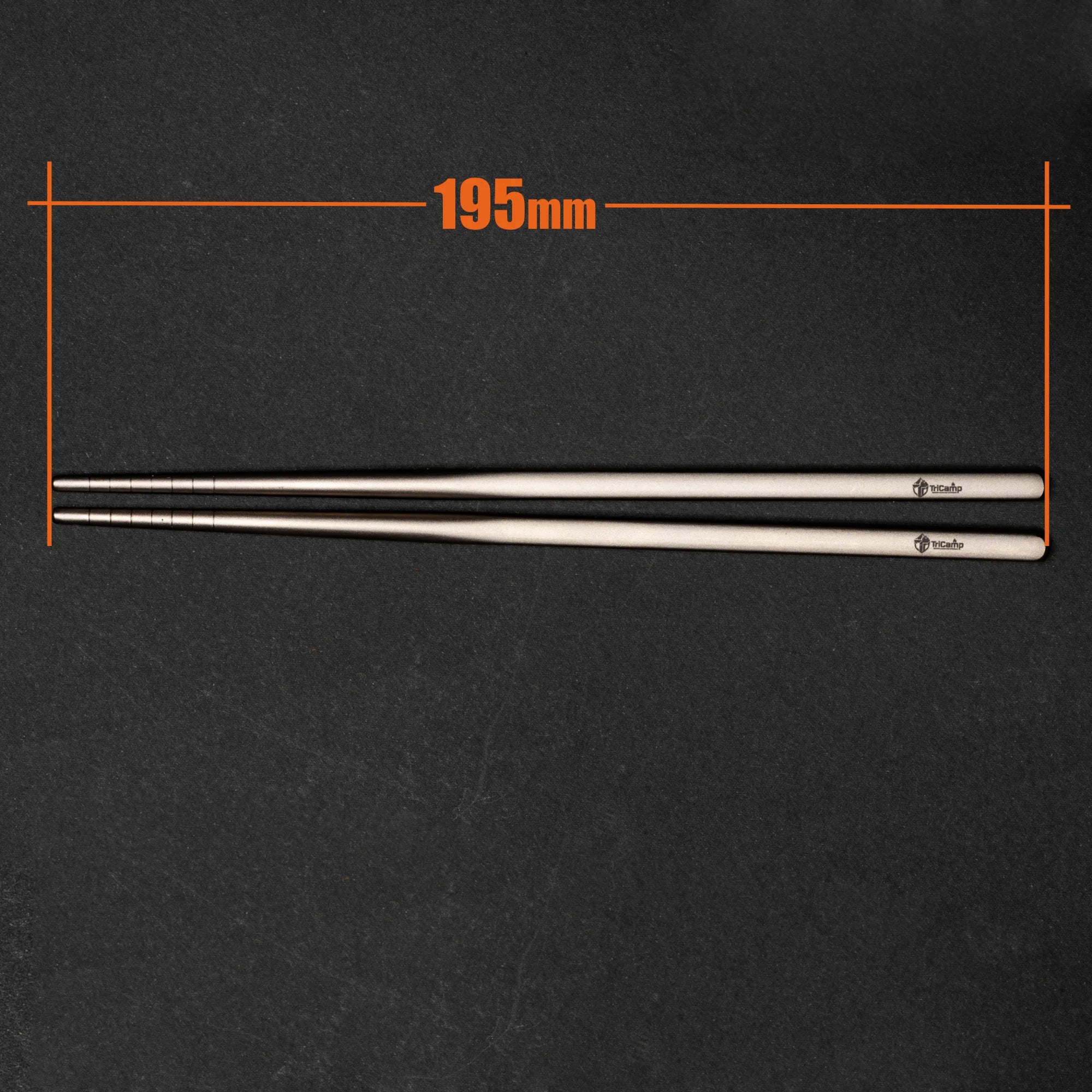 TriCamp Titanium Chopsticks lifestyle — using titanium chopsticks outdoors at campsite
