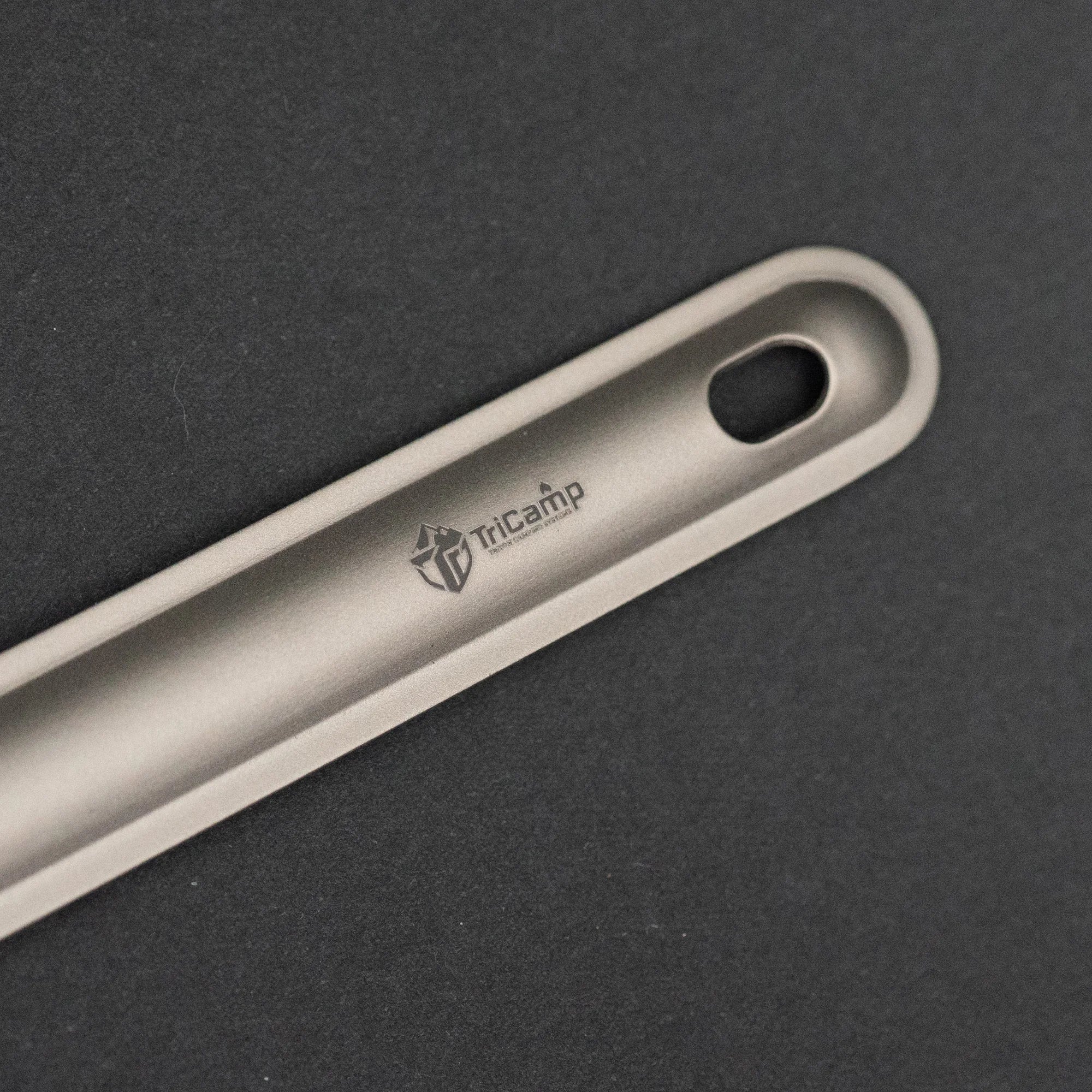 TriCamp Titanium Long Spoon Fork detail — etched grip finish on lightweight camping utensils