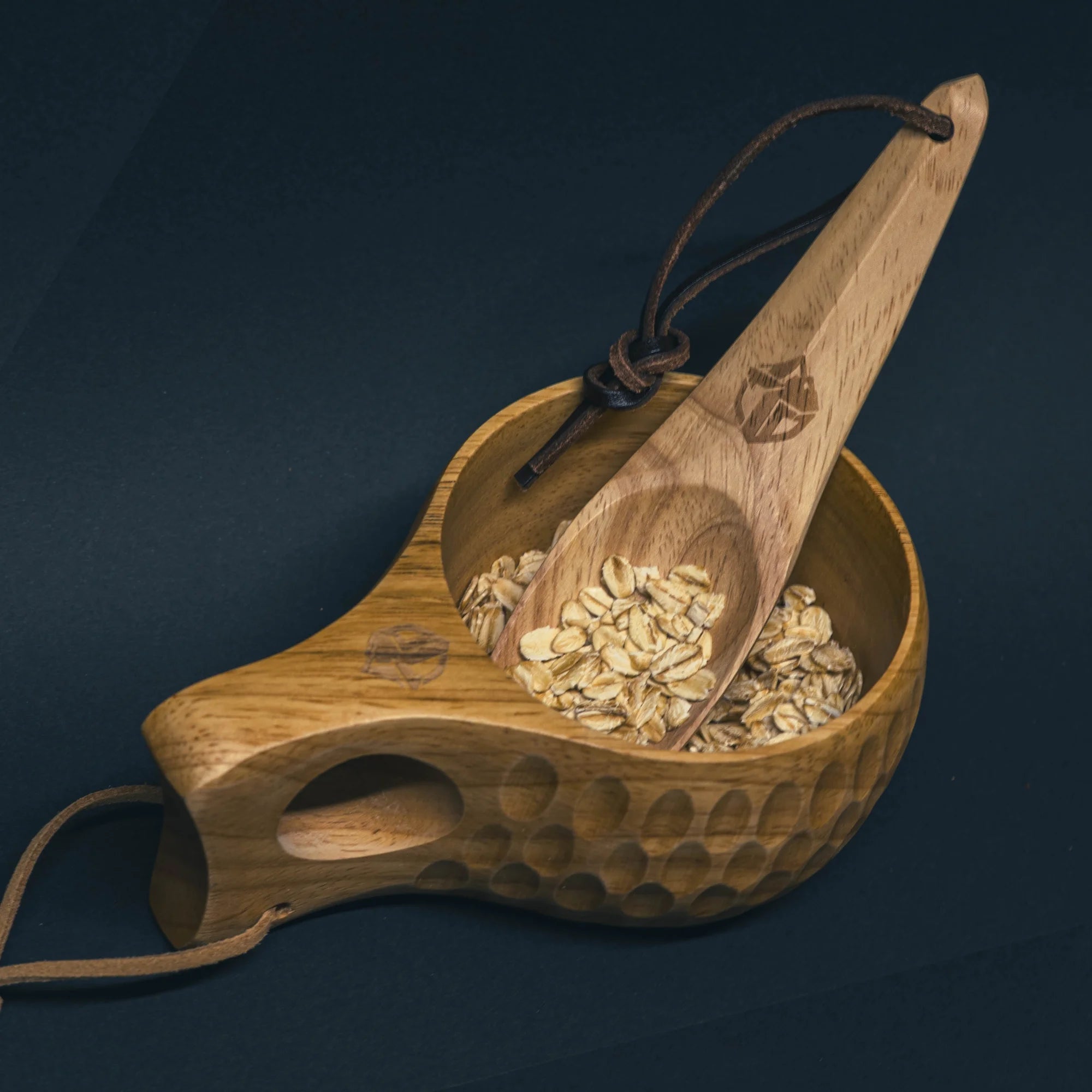 TriCamp Handcrafted Wooden Spoon front view — natural wood grain finish on camp cooking spoon