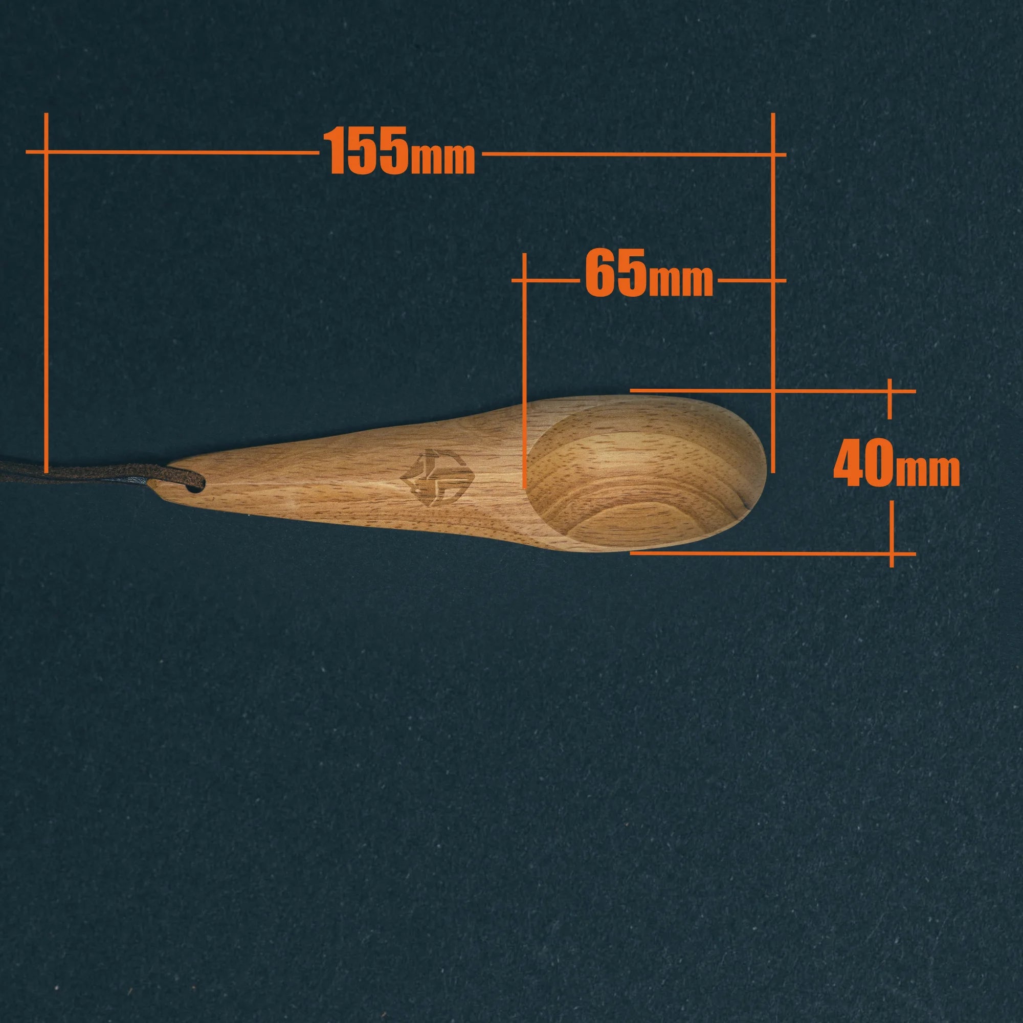 TriCamp Wooden Spoon lifestyle — stirring food over campfire with handcrafted wooden utensil