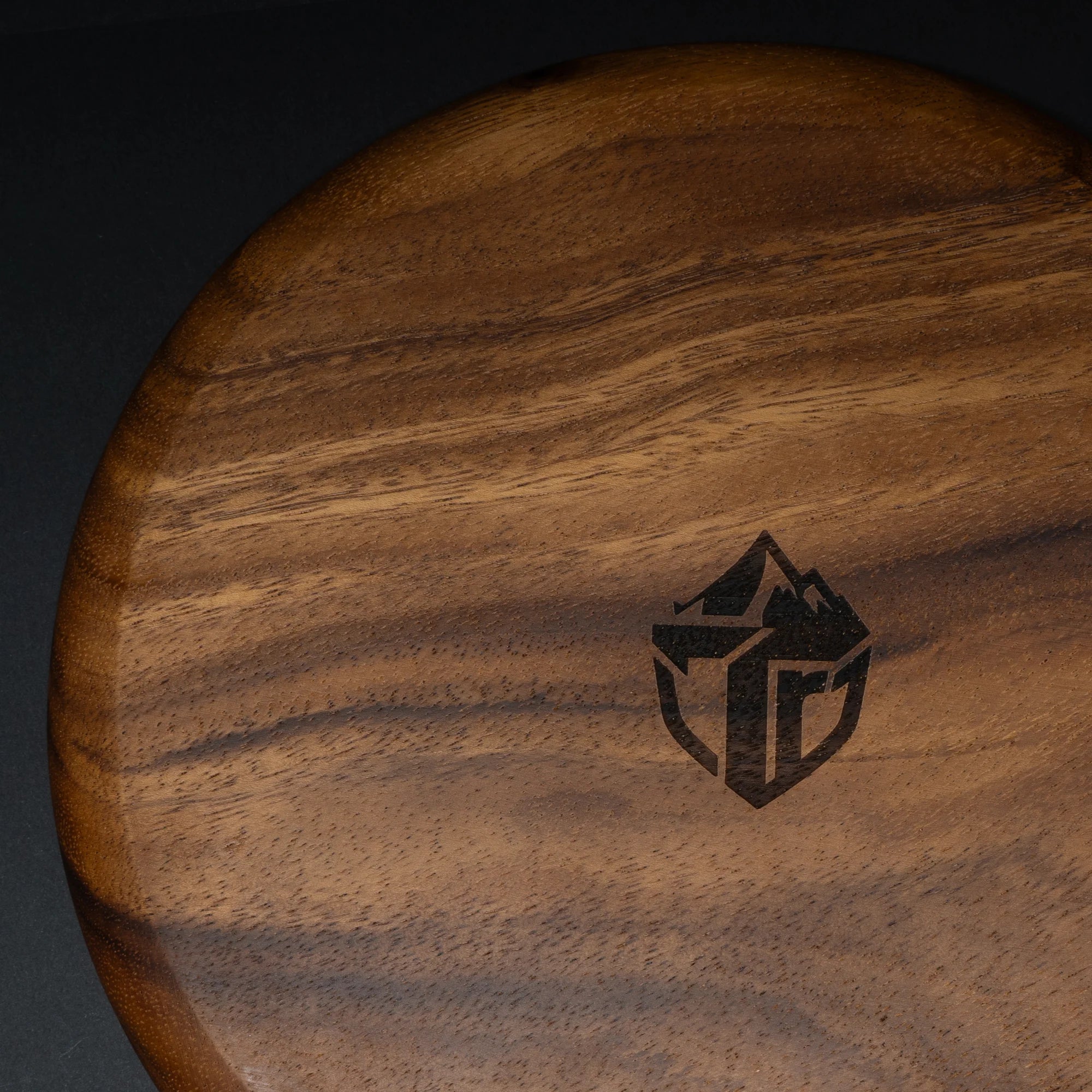 TriCamp Walnut Round Plate 25cm side view — natural walnut wood grain outdoor serving board